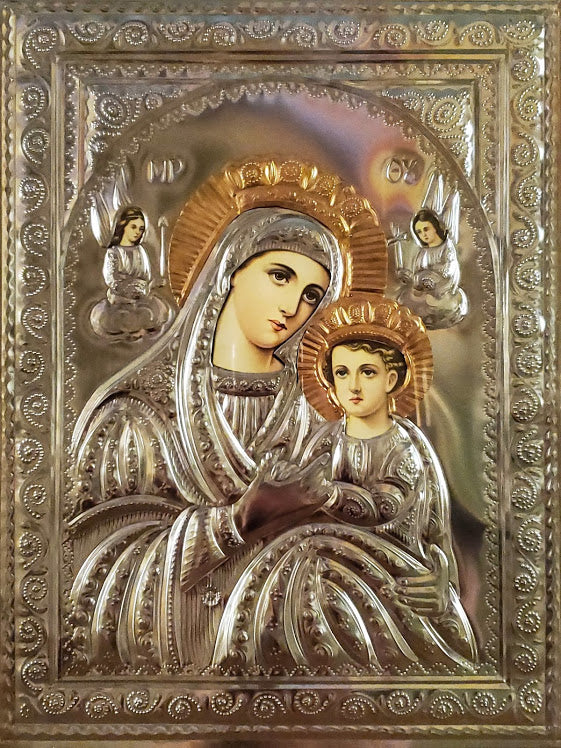 Icon of the Theotokos, candle placement